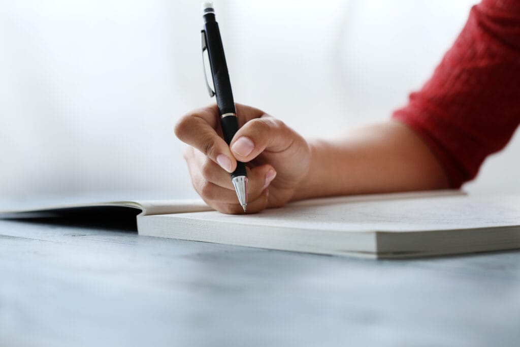 woman with pen